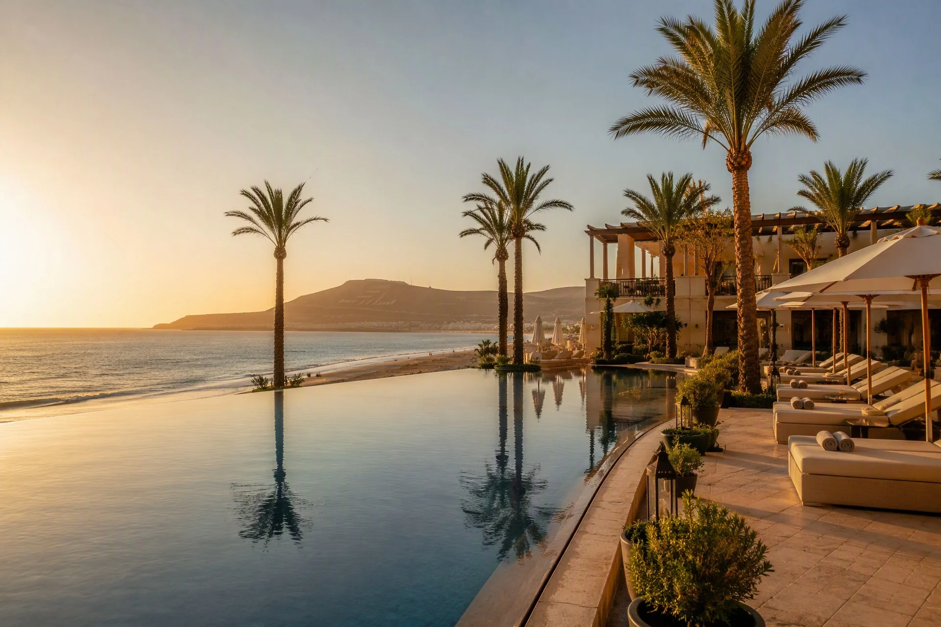 Agadir beachfront resort at golden hour — recovery destination for aesthetic surgery in Morocco