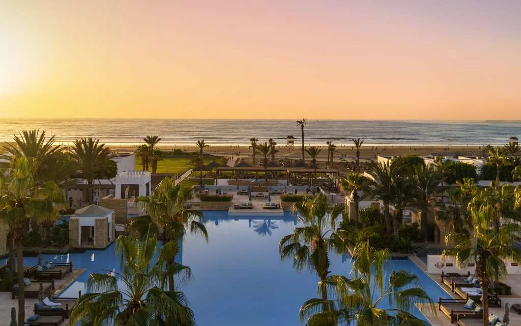 Sofitel Agadir Thalassa Sea & Spa beachfront resort seen from Agadir beach — luxury thalassotherapy recovery hotel in Agadir